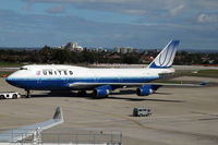 N116UA @ YSSY - YSSY Pushing back for UA840 SYD-LAX shot from the Air New Zealand lounge.