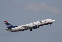 N439US @ KFLL - Boeing 737-400 - by Mark Pasqualino