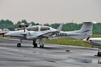 N430PS @ PCM - 2006 Diamond Aircraft Ind Gmbh DA 42, c/n: 42.066 - by Terry Fletcher