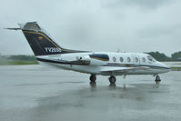 YV2698 @ TPA - Raytheon Aircraft Company 400A, c/n: RK-306 on Tampa Int Exec ramp - just after storm passed through - by Terry Fletcher