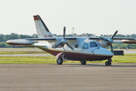 XB-HOV @ ISM - Mexican registered Mitsubishi MU2-2B20, c/n: 156 at kissimmee - by Terry Fletcher