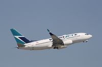 C-GWSN @ KFLL - Boeing 737-700 - by Mark Pasqualino