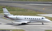N755QS @ TNCM - N755QS taxing for take off at TNCM - by Daniel Jef