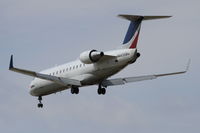 N443SW @ KORD - SkyWest Bombardier CL-600-2B19, SKW7030 arriving from KMLI, RWY 28 approach KORD. - by Mark Kalfas