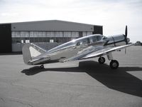 N17634 @ KBTP - Beautiful 1939 Spartan Executive 7W photographed in front of a hangar built by TWA in the 1930's. - by Jim Savage