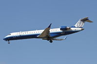 N744SK @ KORD - SkyWest/United Express Bombardier CL-600-2C10, SKW6669 arriving from KMSP, RWY 28 approach KORD. - by Mark Kalfas