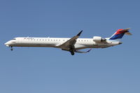 N804SK @ KORD - SkyWest/Delta Connection Bombardier CL-600-2D24, SKW4496 arriving from KSLC, RWY 28 approach KORD. - by Mark Kalfas