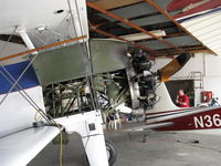 N1702B @ SZP - 1942 Boeing Stearman PT-13D, Continental W670 220 Hp, maintenance-cowls off - by Doug Robertson