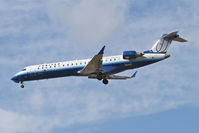 N170GJ @ KORD - GoJet Airlines/United Express Bombardier CL-600-2C10, GJS7430 arriving from KBNA, RWY 28 KORD. - by Mark Kalfas