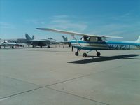 N4272U @ KLGB - 150 parked next to F18 hornets at Long Beach. - by Herman Posada