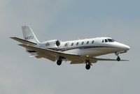N43TJ @ KSAT - Landing 12R - by RWB
