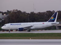 TS-IND @ LMML - A320 TS-IND Nouvelair - by raymond