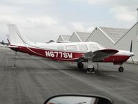 N677SW @ CCB - Covered and tied down in transient parking - by Helicopterfriend