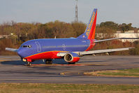 N317WN @ ORF - Southwest Airlines N317WN exiting RWY 5 after landing.