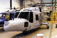XZ250 @ EGDY - former Royal Navy 'Wildcat' display team Lynx inside Hangar 6. Rumoured to be going to the International Helicopter Museum, Weston-super-Mare - by Chris Hall