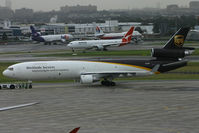 N272UP @ YSSY - taxiing to cargo area - by Bill Mallinson