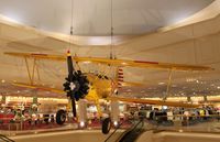 N75662 - Stearman on display at Von Maur Department Store at the former Glenview NAS - by Mark Pasqualino