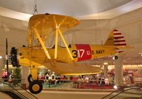 N75662 - Stearman on display at Von Maur Department Store at the former Glenview NAS - by Mark Pasqualino