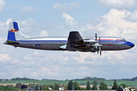 N996DM @ LOWL - Red Bull Douglas DC-6B over RWL08 in LOWL/LNZ