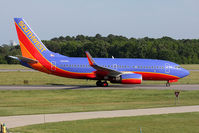 N410WN @ ORF - Southwest Airlines N410WN (SWA3012) from Nashville Int'l (KBNA)taxiing to the gate after landing.