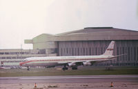 N8788R @ LHR - DC-8-61CF of Saturn Airways on lease to Seaboard World for EFS Cargo seen at Heathrow in March 1976. - by Peter Nicholson