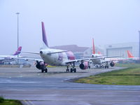 HA-LWI @ EGGW - Wizzair - by Chris Hall