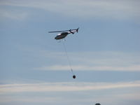 N313DH - Loading water, location High Desert OR - by Maurizio Panicara