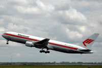 PH-MCG @ EHAM - Martinair Boeing 767-300ER taking off from Schiphol airport, Amsterdam. It is still in the old colour scheme. - by Henk van Capelle