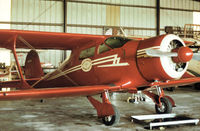 N65596 @ ORL - Beech D17S Staggerwing of Rosie O'Grady's Flying Circus at Herndon in November 1979. - by Peter Nicholson