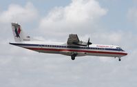 N322AC @ MIA - American Eagle ATR 72 - by Florida Metal