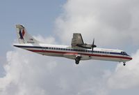 N448AM @ MIA - American Eagle ATR 72 - by Florida Metal