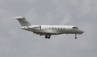 N545XJ @ MIA - CL-300 - by Florida Metal