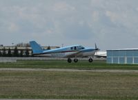 N6896P @ KAXN - Piper PA-24-250 Commanche departing runway 31. - by Kreg Anderson