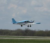 N6896P @ KAXN - Piper PA-24-250 Commanche departing runway 31. - by Kreg Anderson