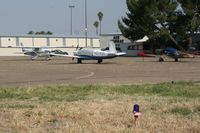 N201QR @ KFUL - Sits with an Air Combat Inc. Marchetti Sf-260 - by Nick Taylor Photography
