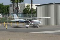 N6980G @ KFUL - Sitting at the western end of the airport. - by Nick Taylor Photography