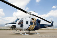 N911KW @ REI - Fire Standby - by Marty Kusch