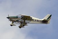 LX-RCD @ ELLX - on final RW24 - by Friedrich Becker