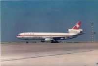 HB-IHK @ LIEE - Charter flight to south Sardinia. Probably on 1988 - by Valter Battistoni