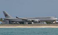 A7-HHH @ TNCM - Qatar Airways departing TNCM