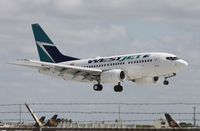 C-GWSJ @ MIA - West Jet 737-600 - by Florida Metal