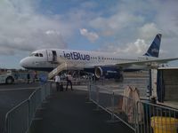 N789JB @ KLGB - What's blue and white and flies allover - by Nick Taylor Photography