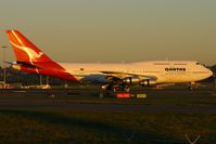 VH-EBT @ YSSY - early morning arrival - by Bill Mallinson