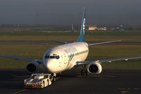 ZK-NGG @ NZCH - and the sun finally pokes thru the fog - by Bill Mallinson