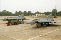 35531 @ EGVA - J-35F Draken with companion 35520 of F10 Wing Royal Swedish Air Force on the flight-line at the 1994 Intnl Air Tattoo at RAF Fairford. - by Peter Nicholson