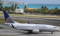 N16703 @ TNCM - Continental/United N16703 taxing for departure at TNCM - by Daniel Jef