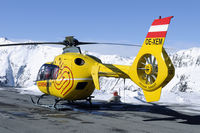 OE-XEM @ LOIP - at Ischgl, at 2290 meter amsl the highest heliport in Europe. - by Joop de Groot