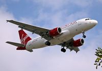 N521VA @ LAX - Landing at LAX on Saturday evening - by G TRUMAN
