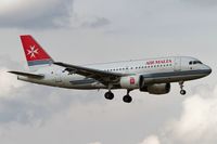 9H-AEH @ LSZH - on final RW14 - by Friedrich Becker