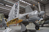 N20MD @ EGSU - In restoration Hangar - by John Richardson